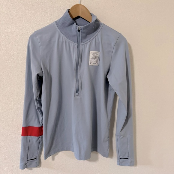 oiselle Tops - Oiselle Head Up Wings Out 1/2 Zip Running Pullover Light Blue Thumbholes NWOT-10